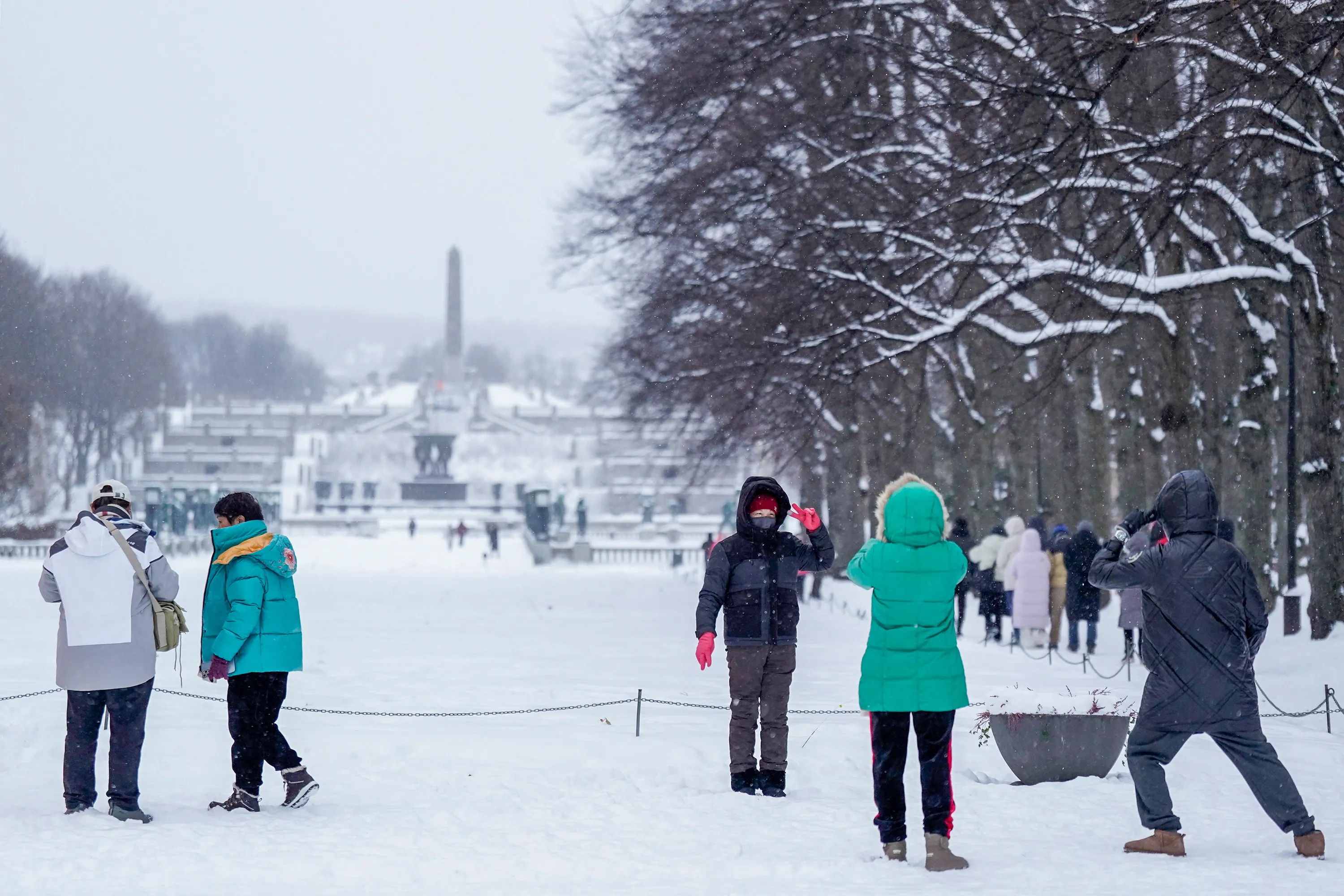 People take photos in the snow in Oslo, Norway, on Jan. 2.