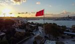 A Turkish flag by the Bosphorus strait in Istanbul, Turkey.