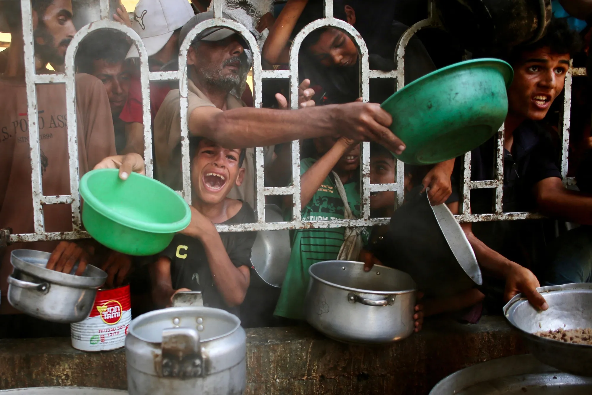Palestinians at a charity kitchen in Khan Younis, Gaza, on July 22.