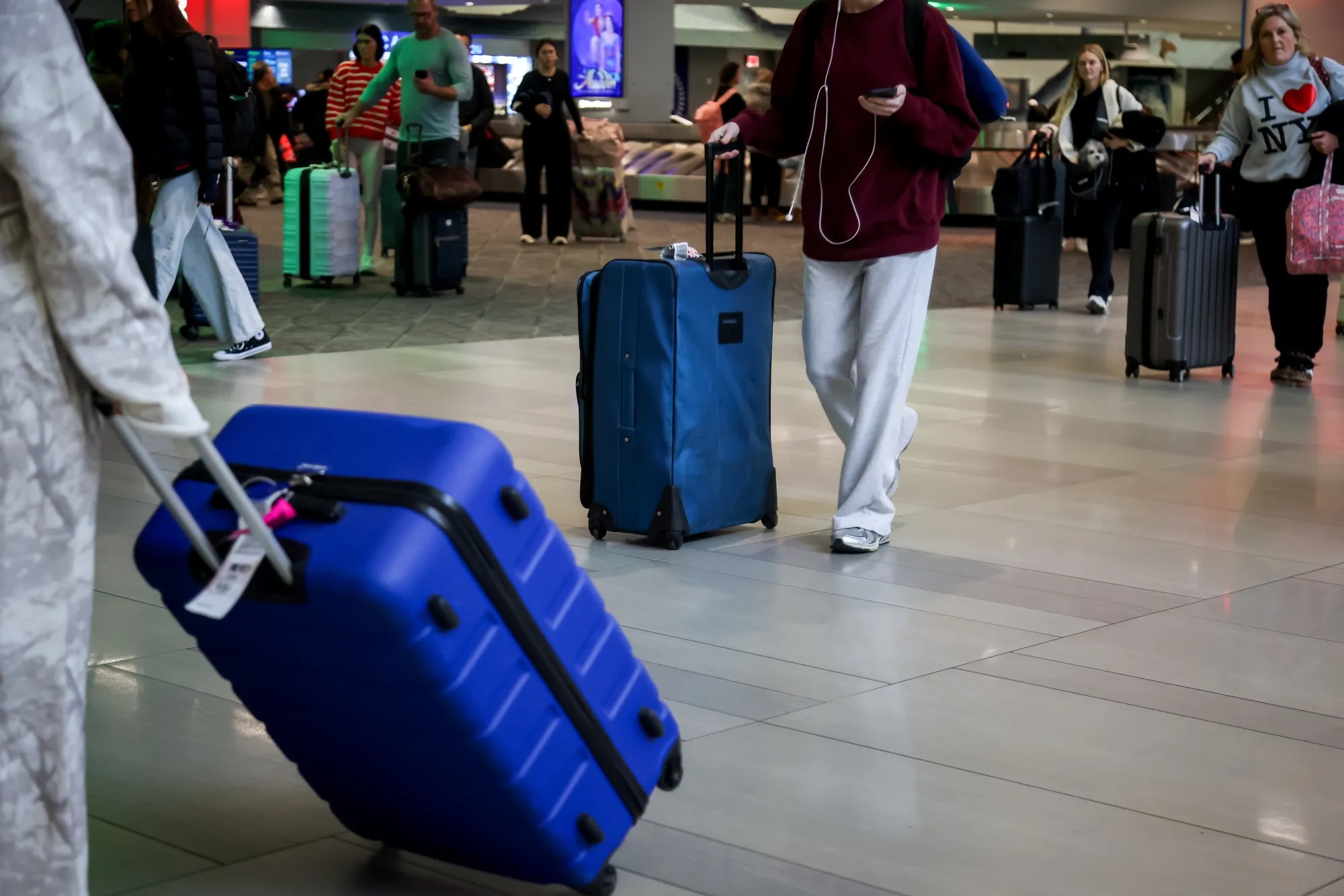 Travelers in Terminal B at LaGuardia Airport in the Queens borough of New York.