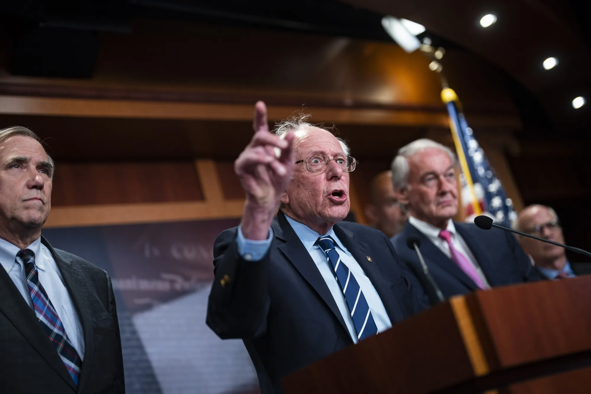 From left, Senator Jeff Merkley, a Democrat from Oregon, Senator Bernie Sanders, Independent from Vermont, and Senator Ed Markey, Democrat from Massachusetts, during a news conference at the US Capitol Thursday. Negotiations&nbsp;over Republican demands for budget cuts in exchange for raising the federal debt limit may reach an agreement in principle as soon as this weekend.