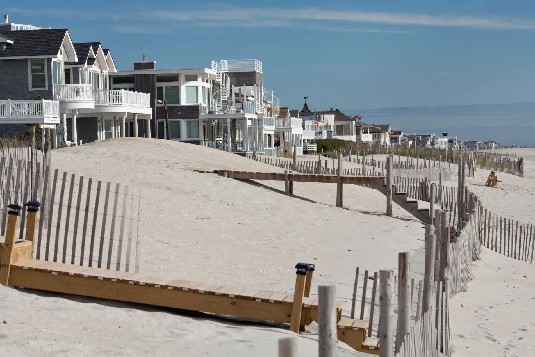 Ocean front homes stand along the beach on Long Beach Island in Long Beach Township, New Jersey.