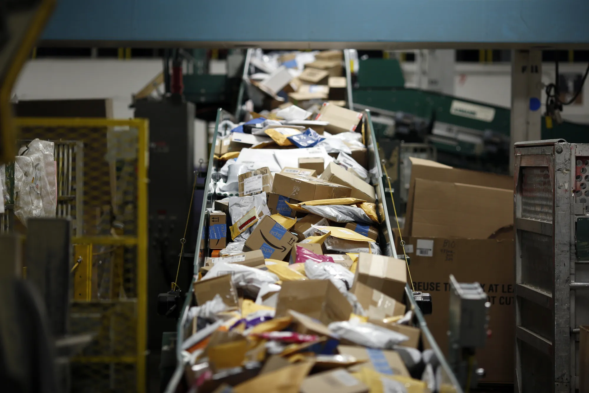 Small parcels move along a conveyor belt at the United States Postal Service sorting center in Louisville, Kentucky.