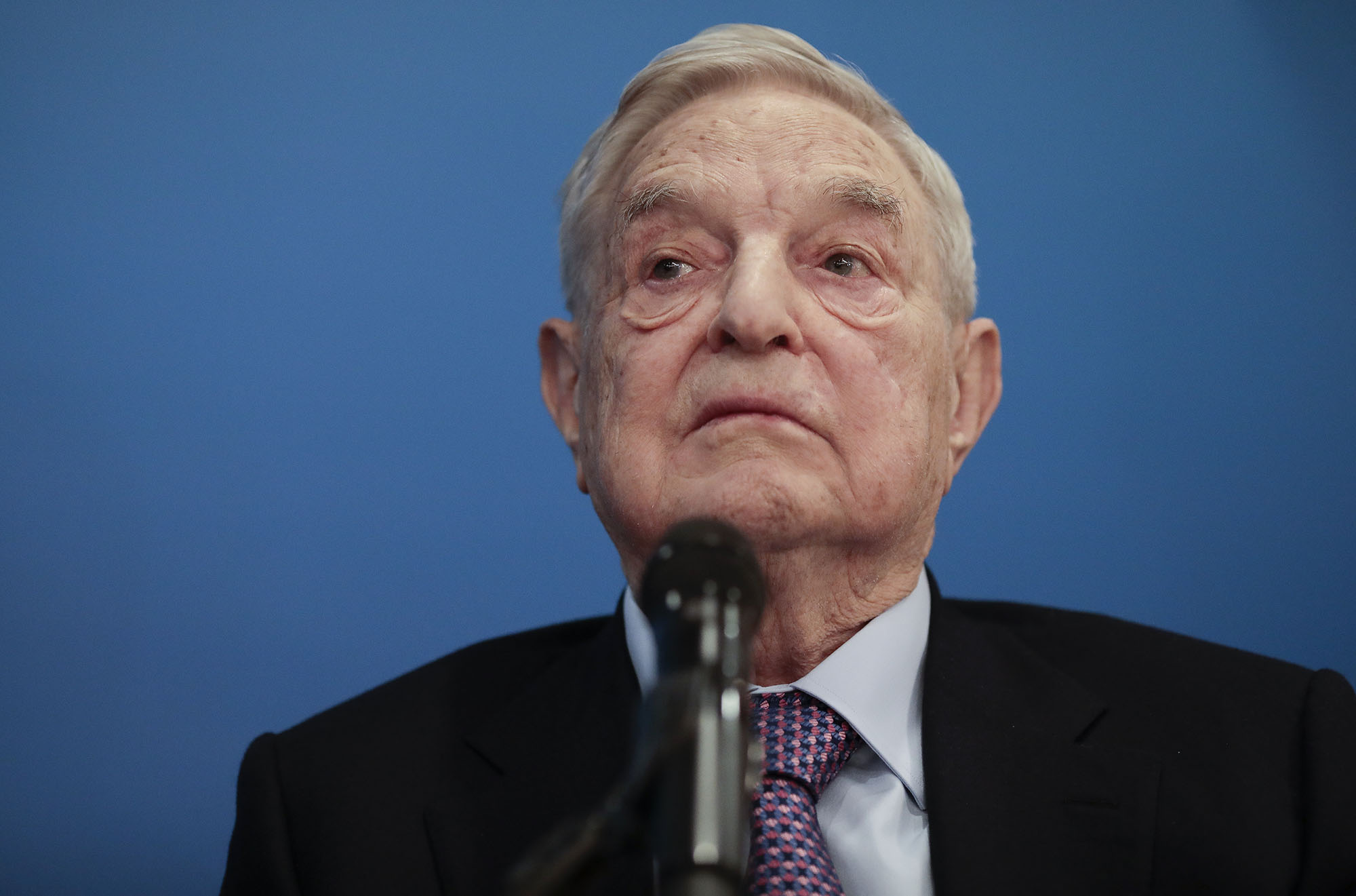 George Soros, billionaire and founder of Soros Fund Management LLC, pauses during an interview.
