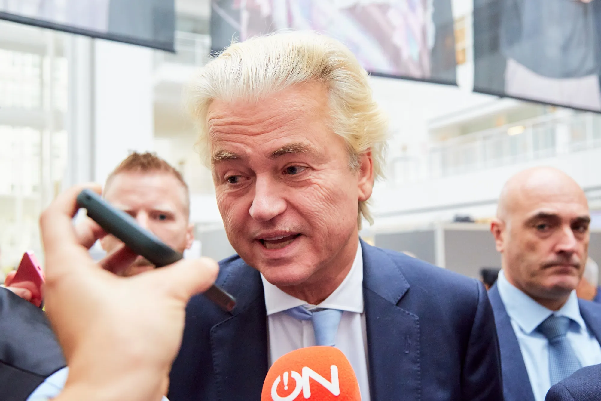 Geert Wilders speaks to the media while casting a&nbsp;ballot during the Dutch parliamentary election in The Hague on Oct. 29.