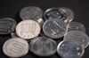 Japanese 100 yen coins are arranged for a photograph in Kawasaki, Kanagawa Prefecture, Japan, on Saturday, July 7, 2018. Japan’s currency rose against every single Group-of-10 peer in the first half, with an average 4.8 percent gain. Now a combination of U.S. protectionism, European populism and emerging market turmoil threatens to push the yen even higher in the second half, according to analysts.