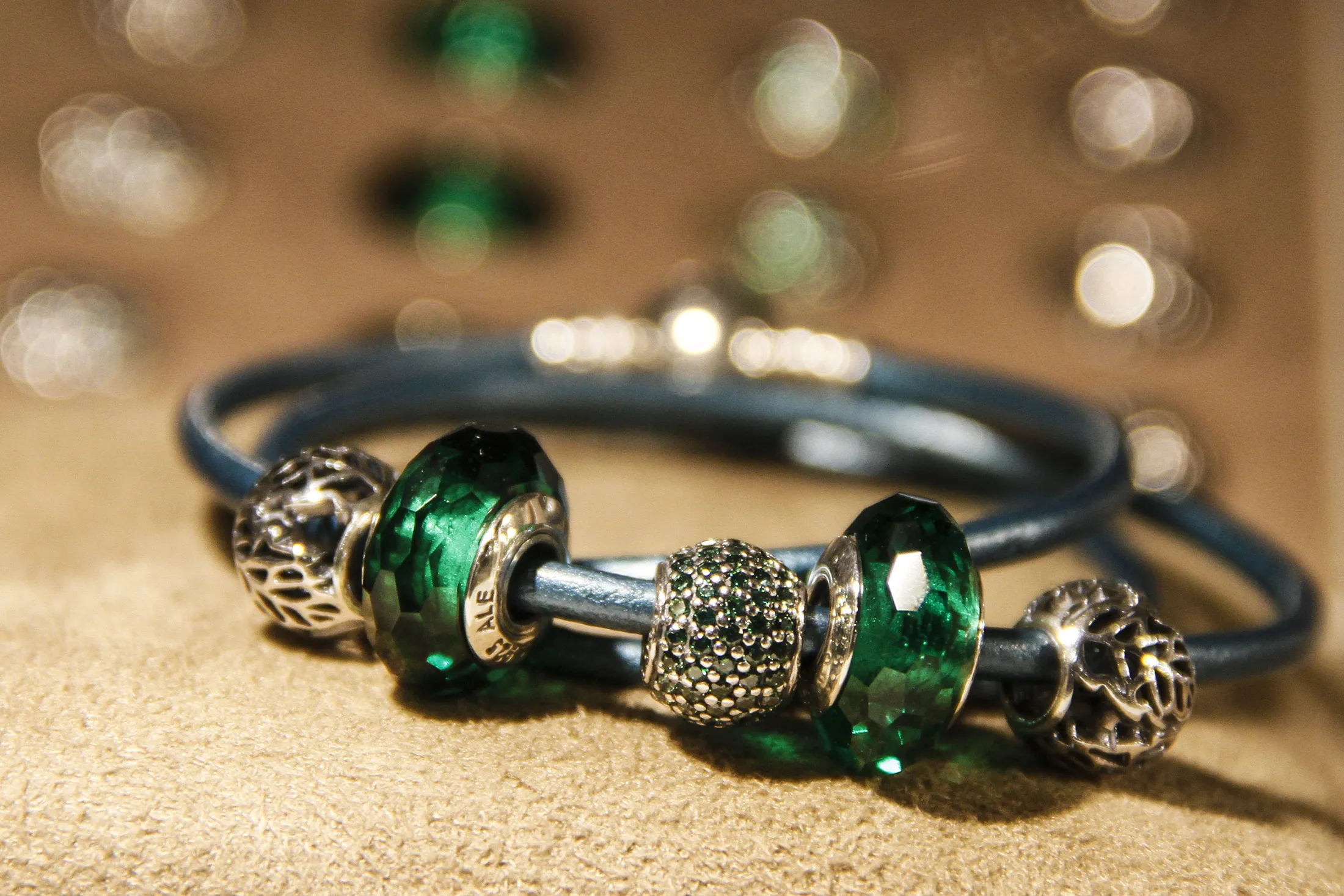 A charm bracelet sits on display in the window of a Pandora A/S jewelry store in Copenhagen.
