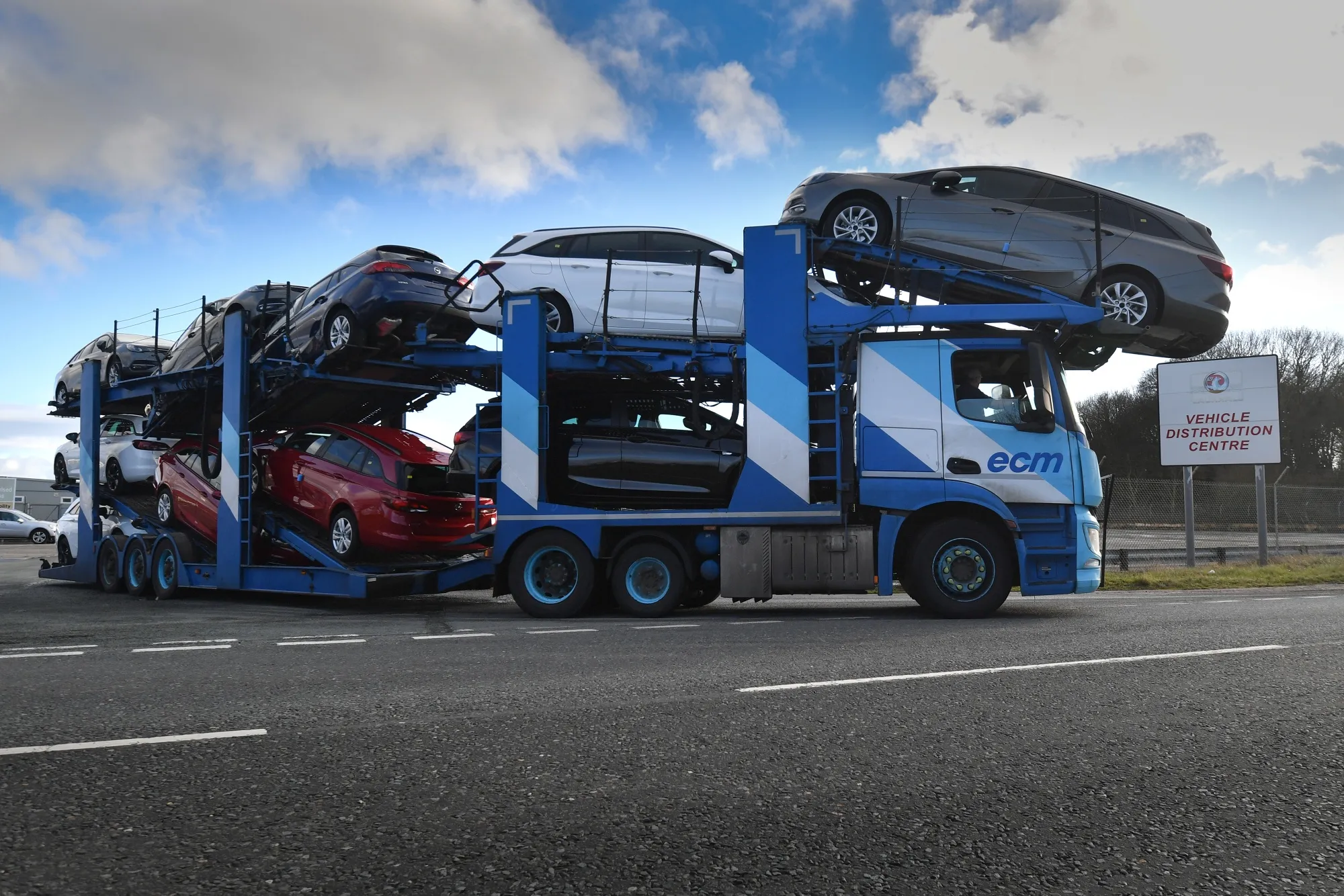 A vehicle transporter leaves the Vauxhall plant in Ellesmere Port, UK.