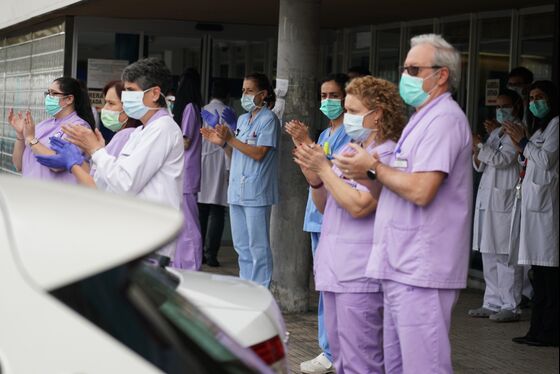 Europe’s Desperate Doctors Are Shielded by Trash Bags