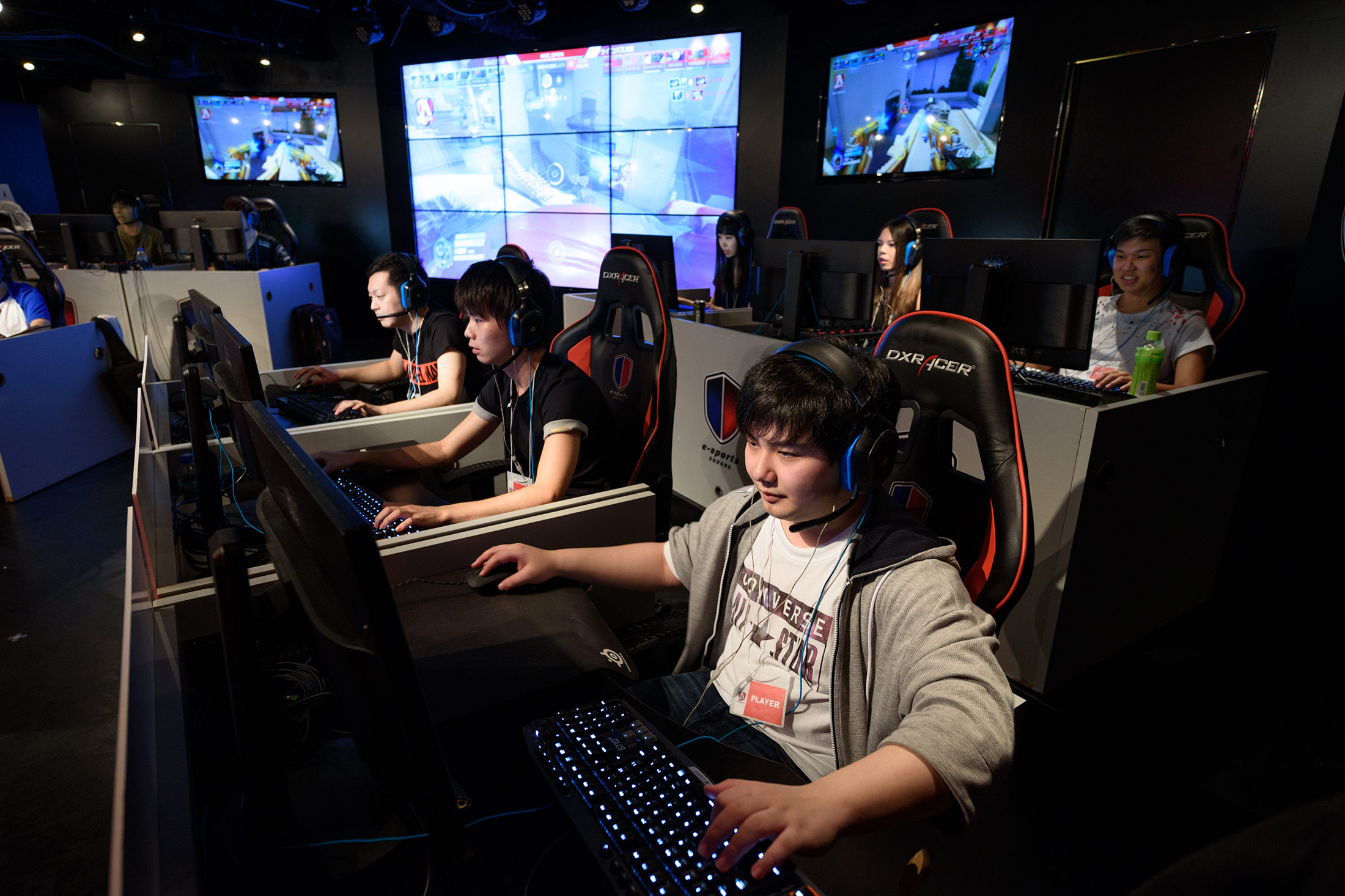 Competitors at the AOC Open e-Sports event in Tokyo on July 1 battle over a total purse of $4,300.
