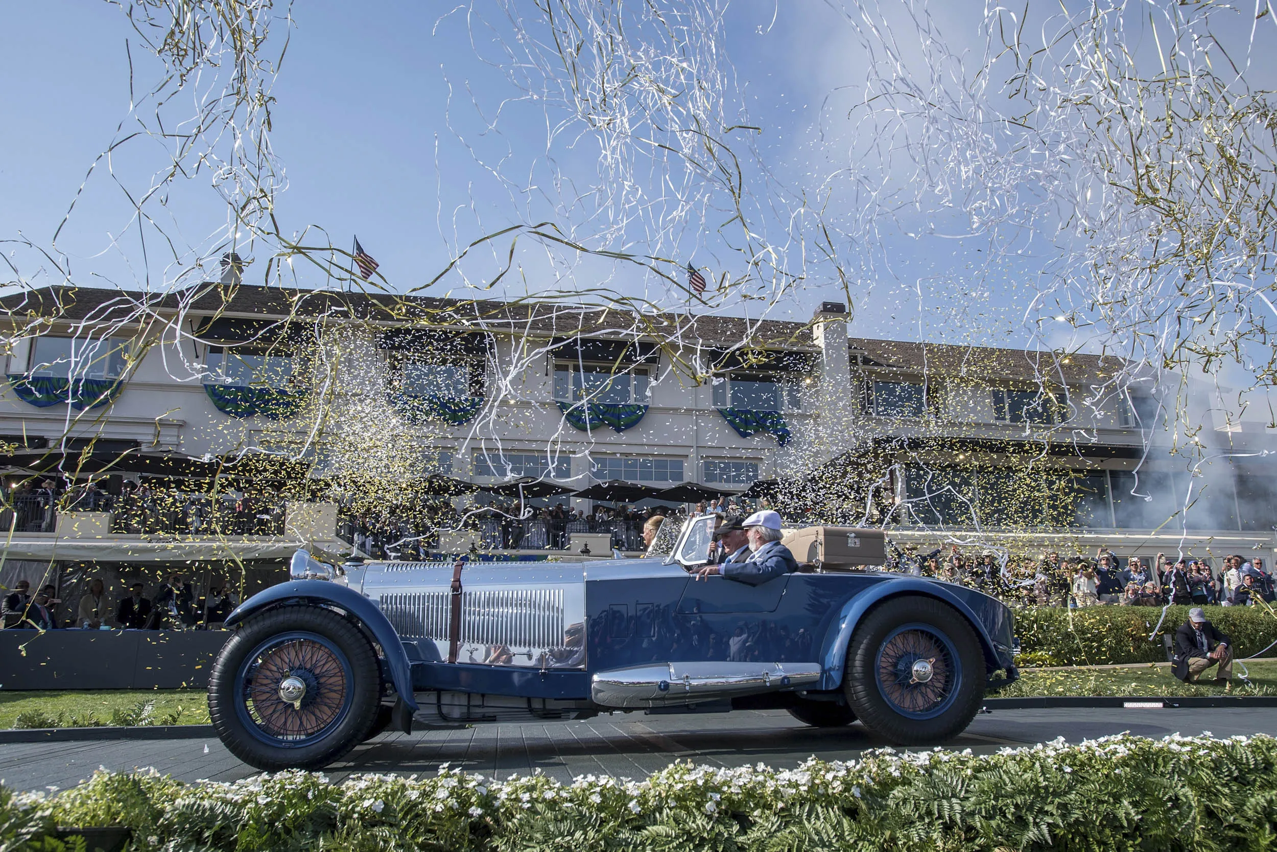 Bruce McCaw drives his 1929 Mercedes-Benz S Barker Tourer through a shower of confetti to accept the Best of Show award during the 2017 Pebble Beach Concours d’Elegance in 2017.&nbsp;&nbsp;