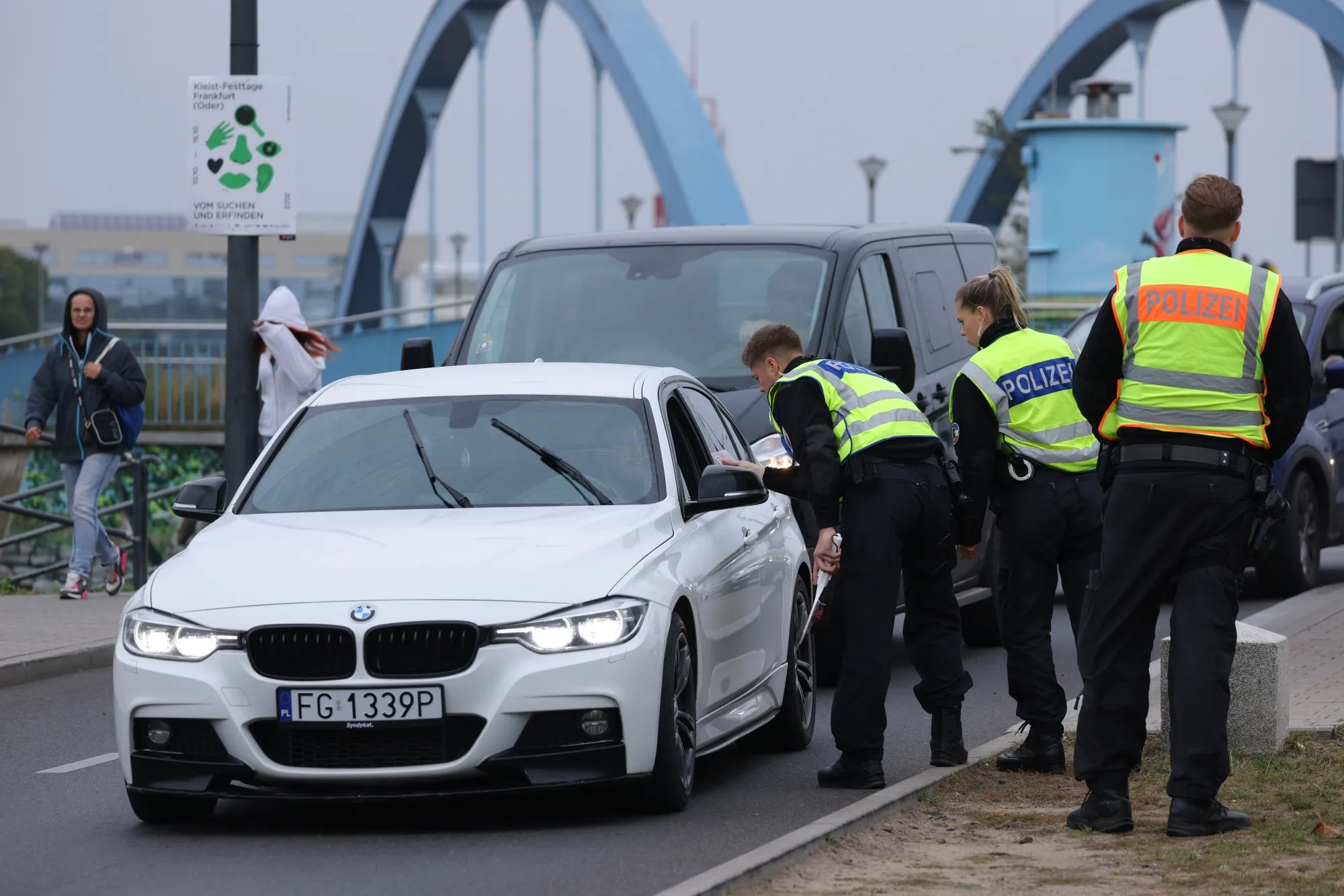 German police check vehicles arriving at a temporary border checkpoint in Frankfurt.
