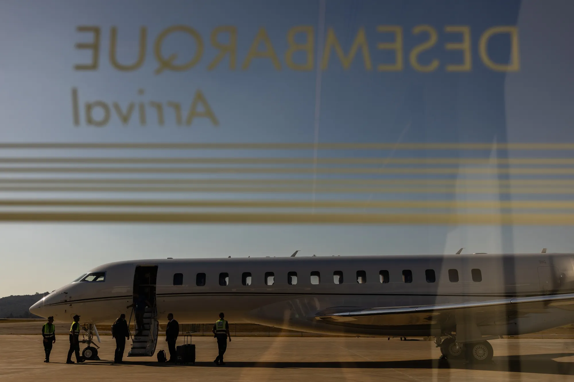 Grounds crew assist a private jet at the Sao Paulo Catarina International Executive Airport.