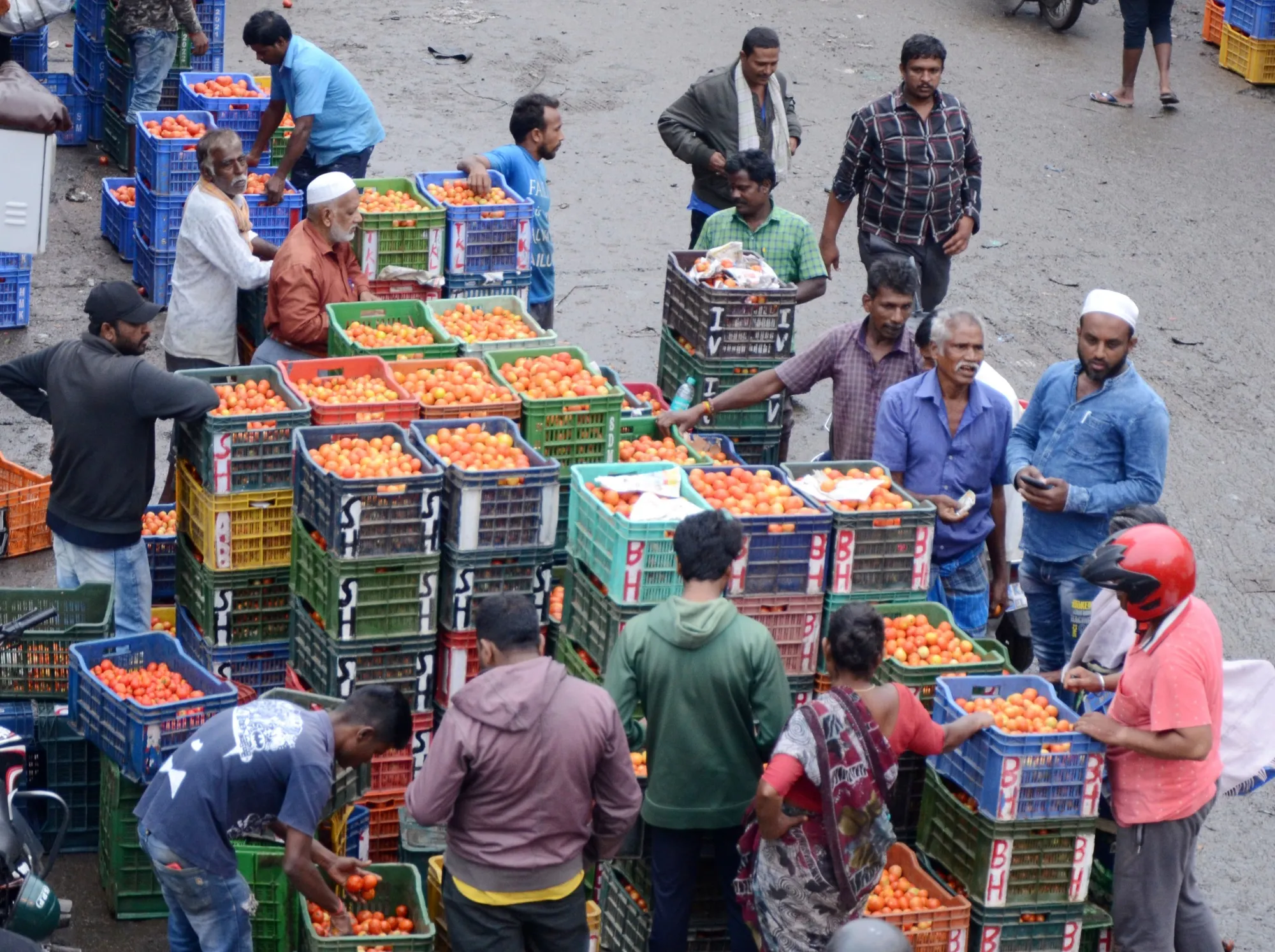 Vendors sell tomatoes at a market in Bengaluru on July 12.