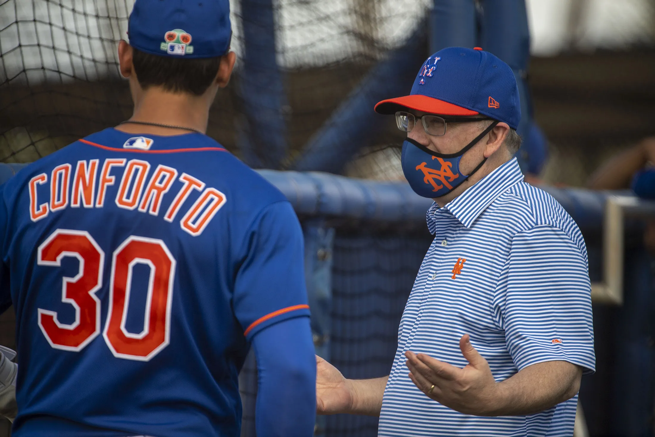 Steve Cohen speaks with Mets players during a spring training workout in Port St. Lucie, Florida, on Feb. 27.