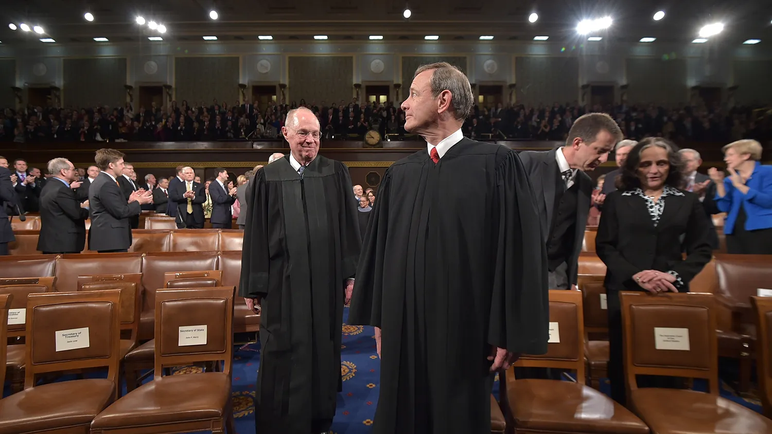 U.S. Supreme Court Chief Justice John G. Roberts (L) and Justice Anthony M. Kennedy arrive for the State of the Union address by President Barack Obama on January 20, 2015 in the House Chamber of the U.S. Capitol in Washington, DC.
