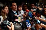 Juan Guaido talks to the press outside his home in Santa Fe, Caracas on Jan. 31.