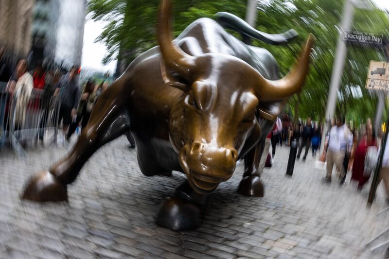 The "Charging Bull" statue near the New York Stock Exchange (NYSE) in New York, US, on Thursday, May 16, 2024. The Dow Jones Industrial Average eclipsed 40,000 for the first time on Thursday as investors grow confident that the stock market rally can keep running on hopes the Federal Reserve will start cutting interest rates later this year.
