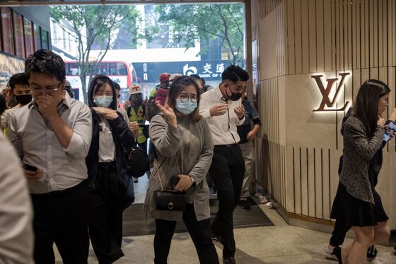 Hong Kong Banks Send Some Staff Home as Tear Gas Wafts Outside
