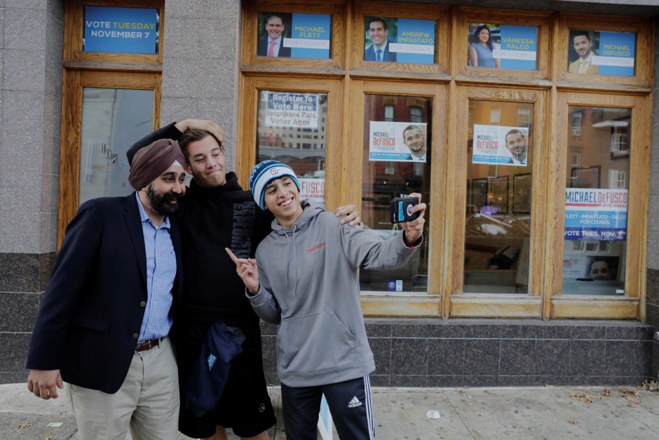 Hoboken, New Jersey Mayor-elect Ravi Bhalla snaps a selfie with supporters.