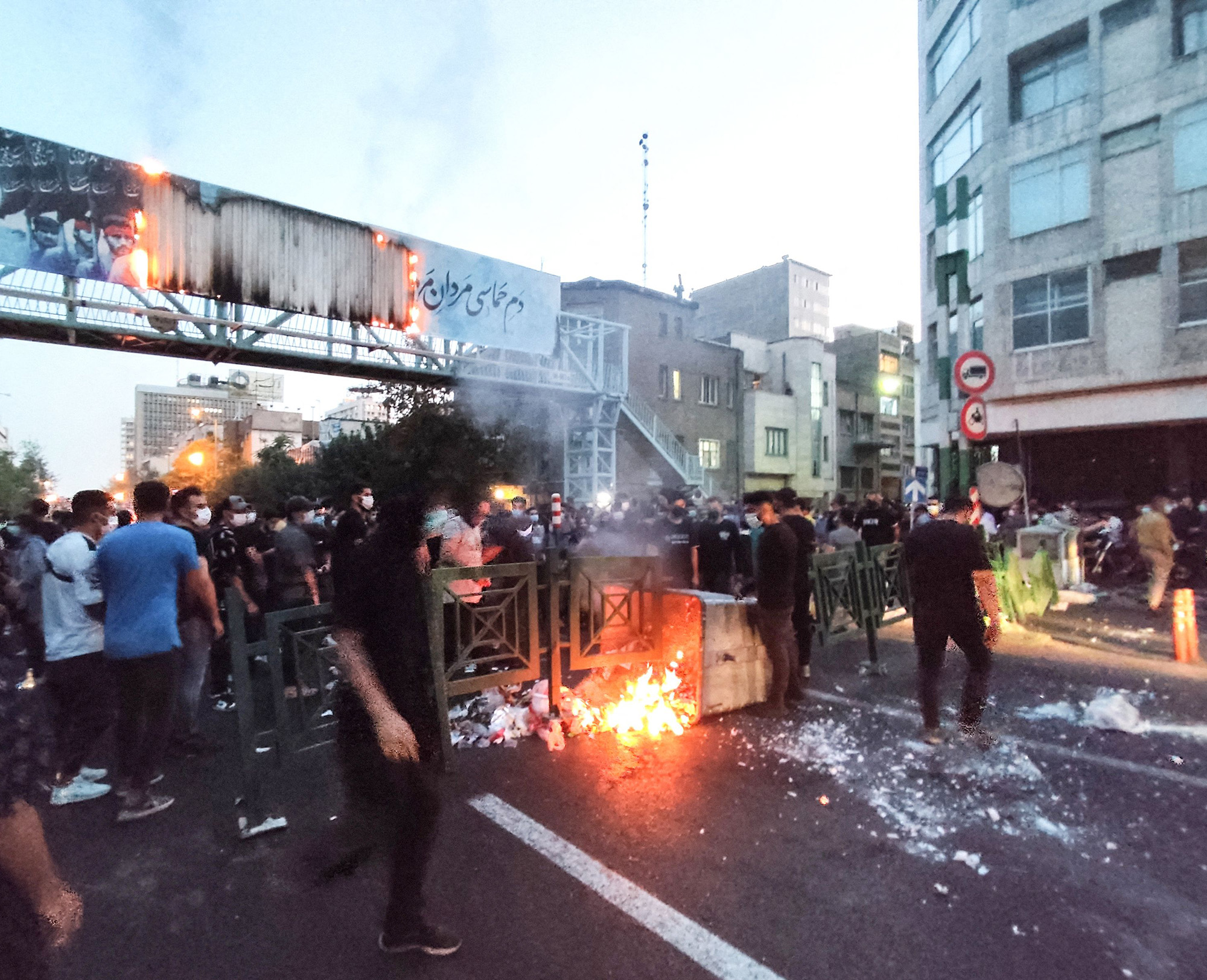 A picture obtained by AFP outside of Iran&nbsp;shows demonstrators burning rubbish during a protest&nbsp;in Tehran, on Sept.&nbsp;21.