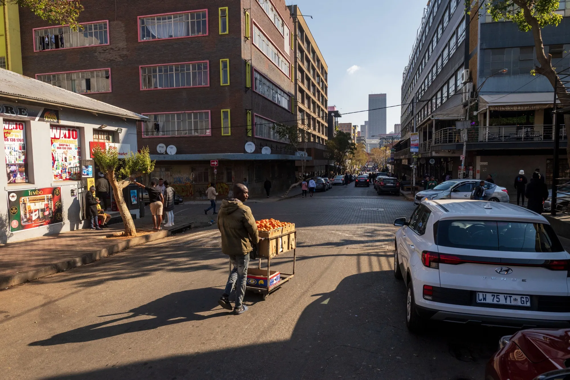 A street vendor sells oranges in Johannesburg.