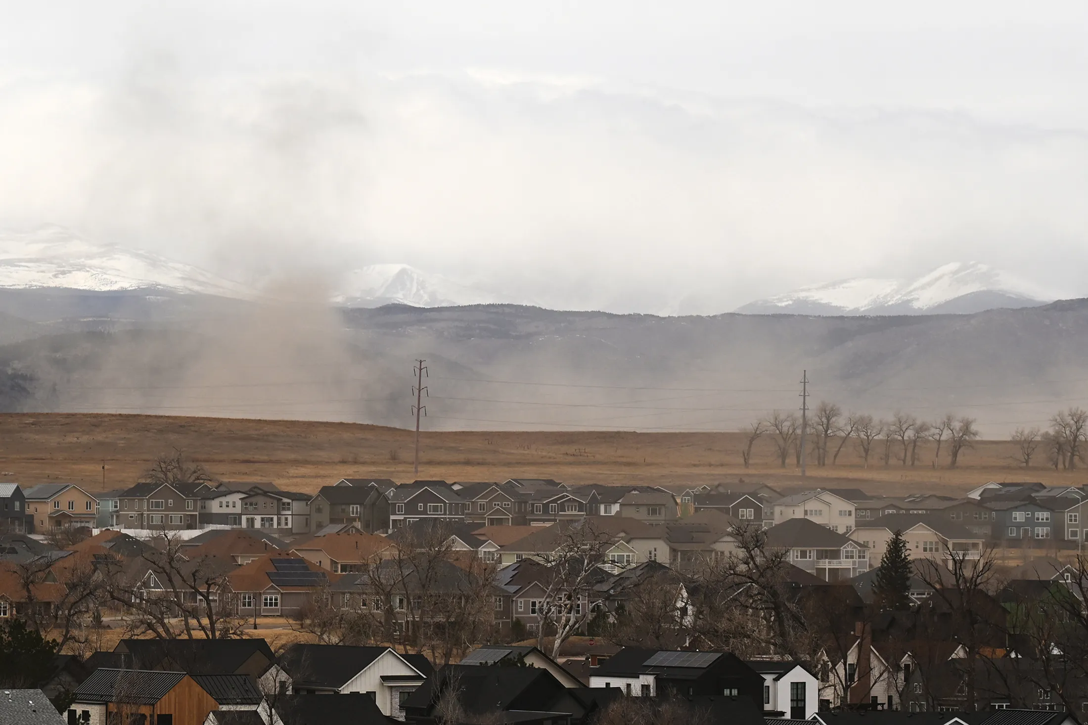 Strong wind blow dust into the air in the foothill near Superior, Colorado, on March 12.