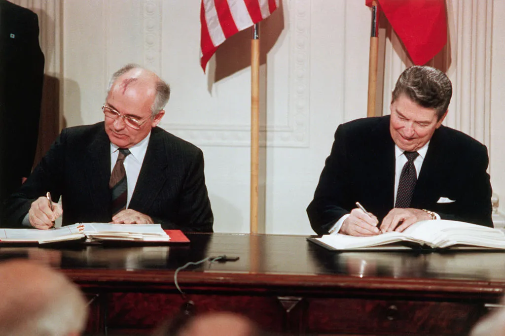Reagan and Gorbachev Signing Arms Limitation Agreement