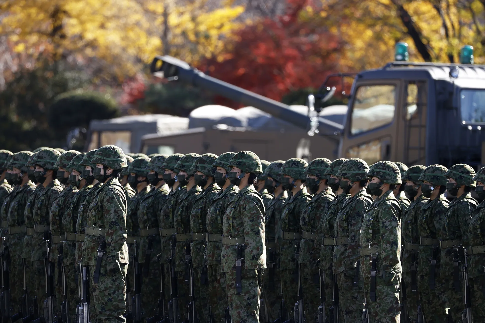 Members of the Japan Ground Self-Defense Force (JGSDF) during a review at JGSDF Camp Asaka in Tokyo.&nbsp;