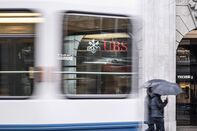 A tram passes the UBS headquarters in Zurich.