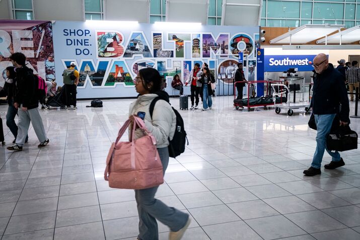 Travelers at Baltimore Washington International Thurgood Marshall Airport.