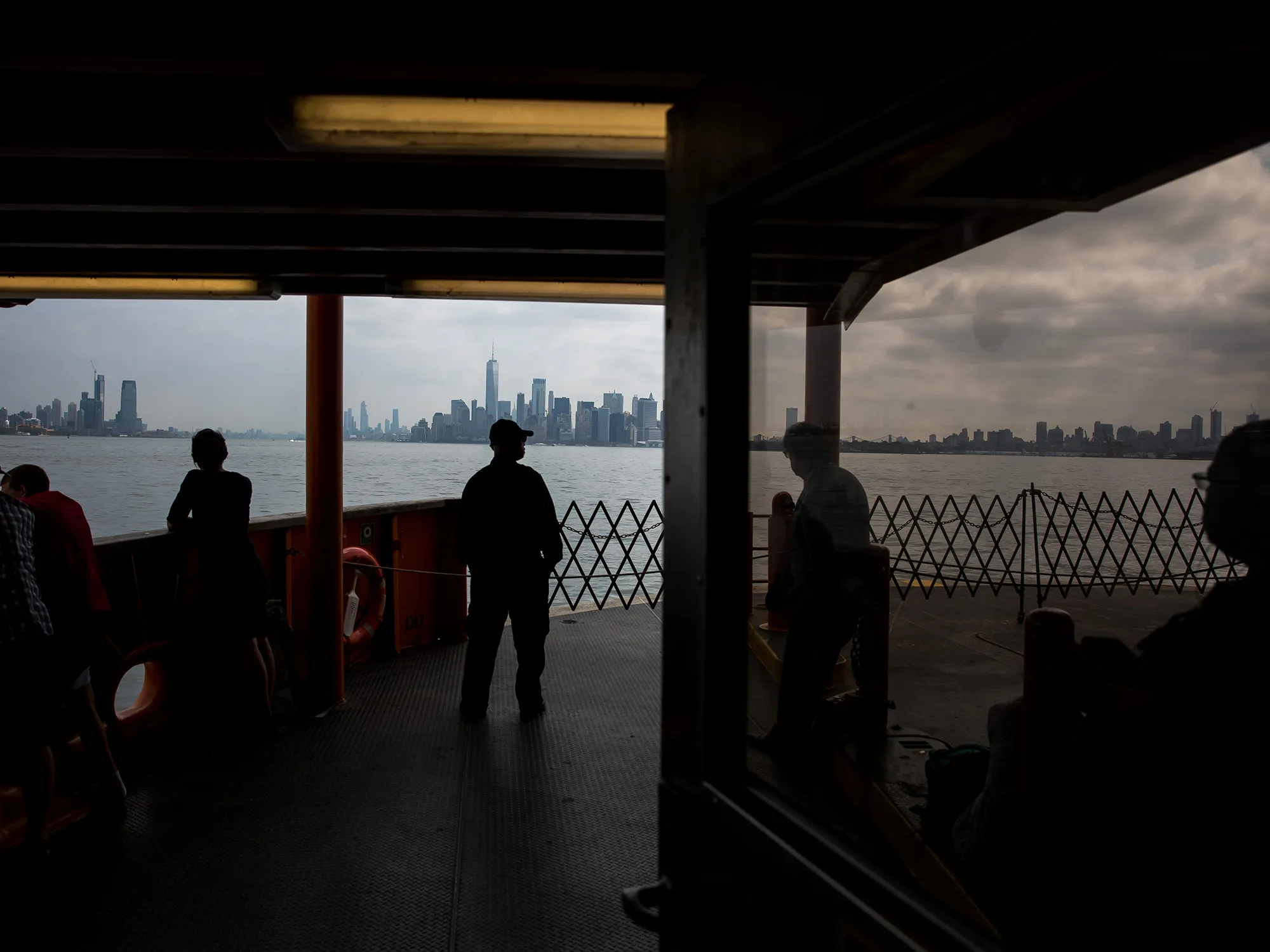 Commuters ride the Staten Island Ferry in New York.