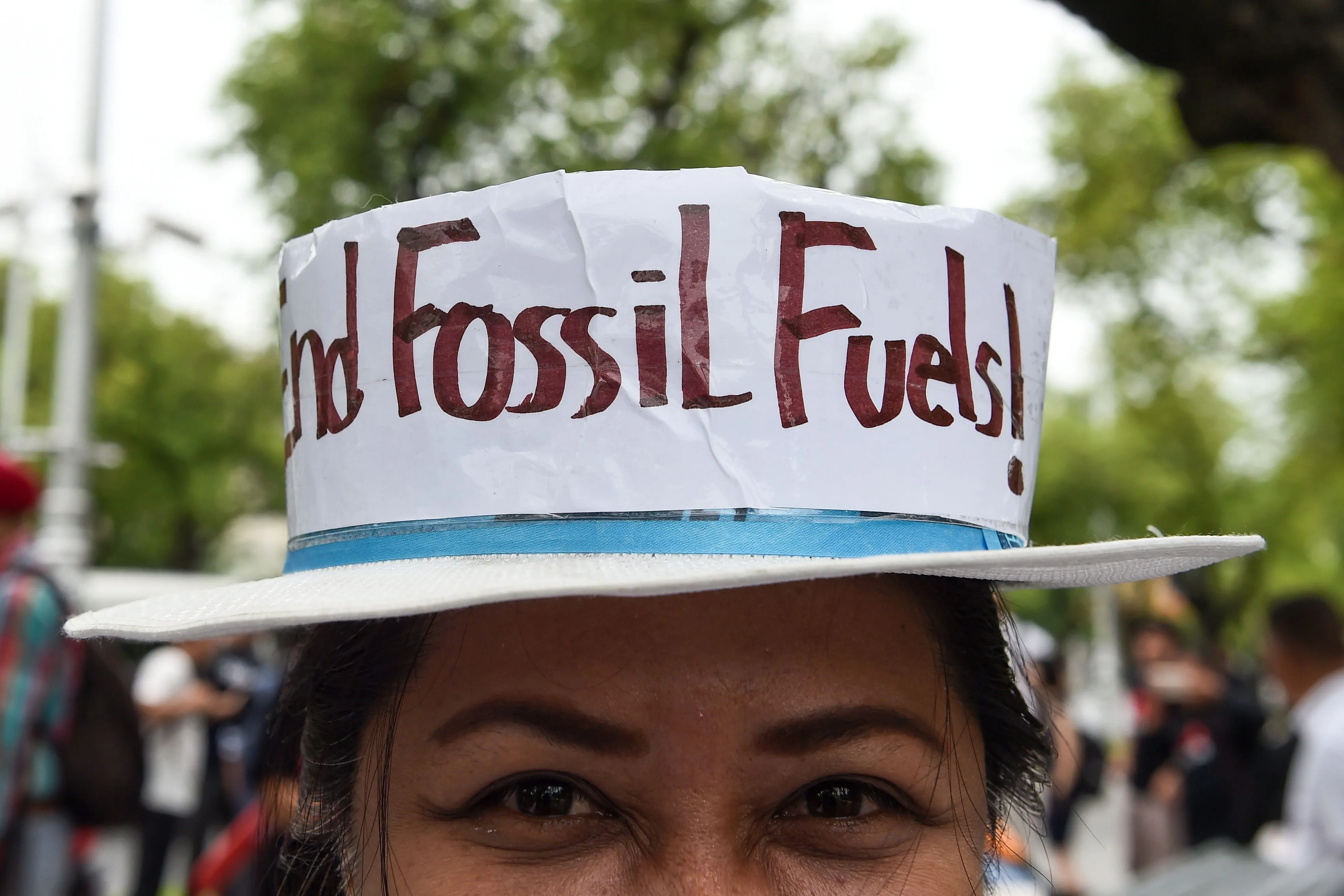 A protestor demonstrates in front of the United Nations building,&nbsp;in Bangkok on Sept. 8.