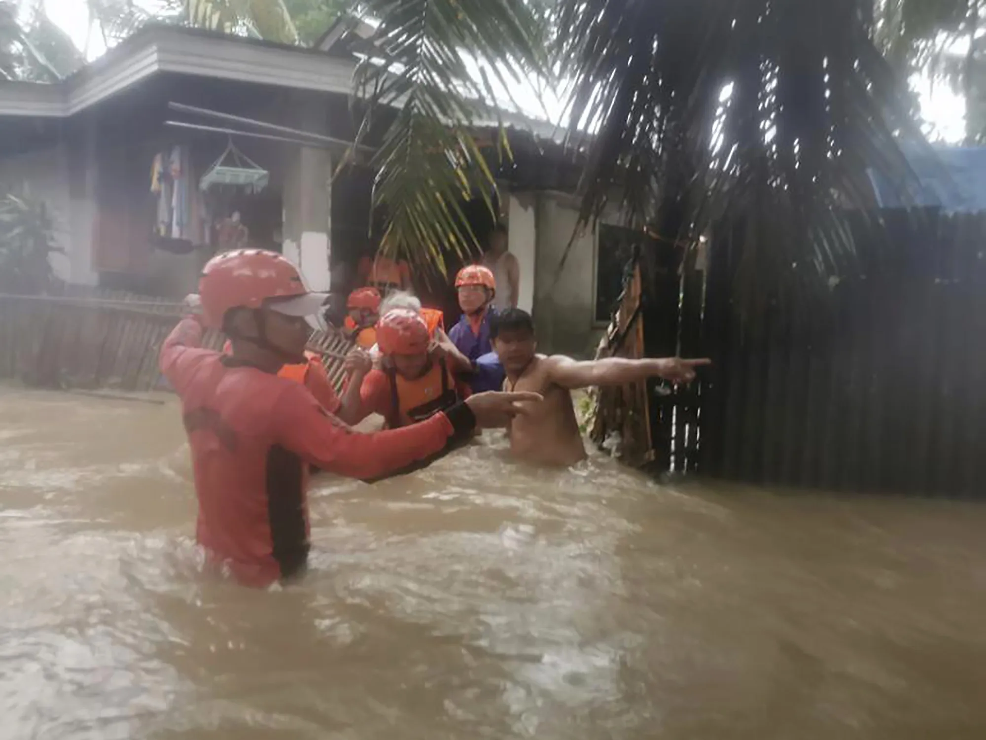 Rescuers evacuate residents following&nbsp;floods caused by tropical storm Choi-wan, in Maasin City, Philippines on June 1.