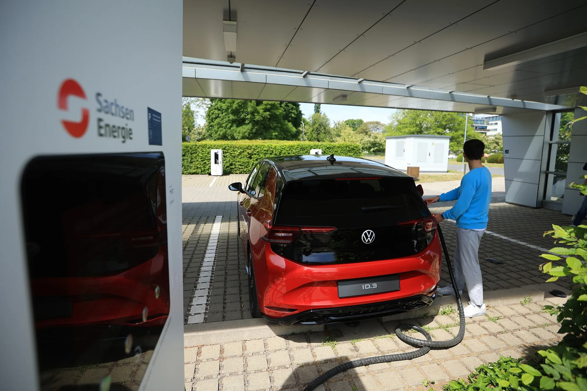Electric vehicle charging in Dresden, Germany.