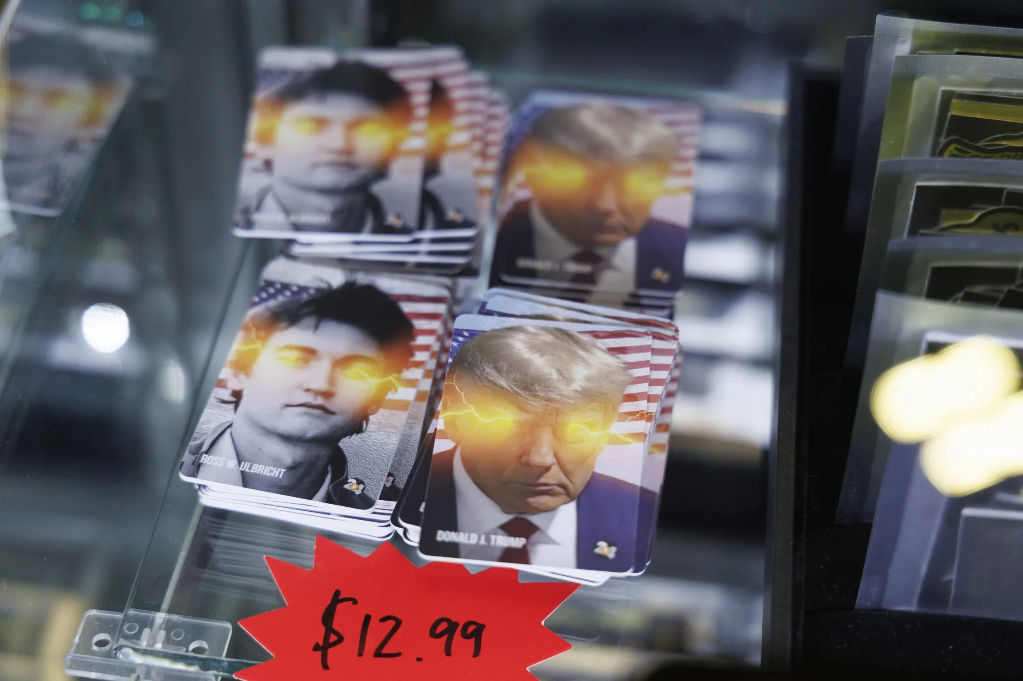 Cards featuring images of former President Donald Trump and Ross Ulbricht, creator of Silk Road, displayed for sale at the Bitcoin 2024 conference in Nashville in July.