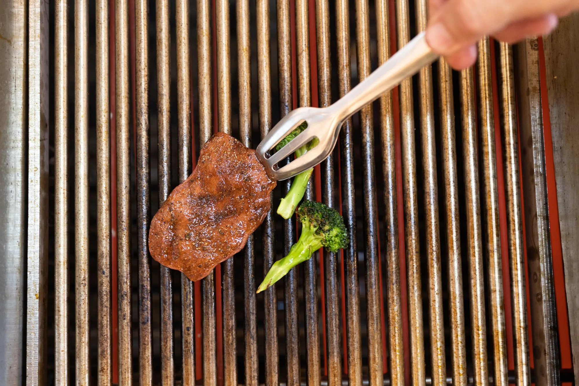 A chef grills a piece of cultivated thin-cut steak in the Aleph Farms Ltd. development kitchen in Rehovot, Israel.