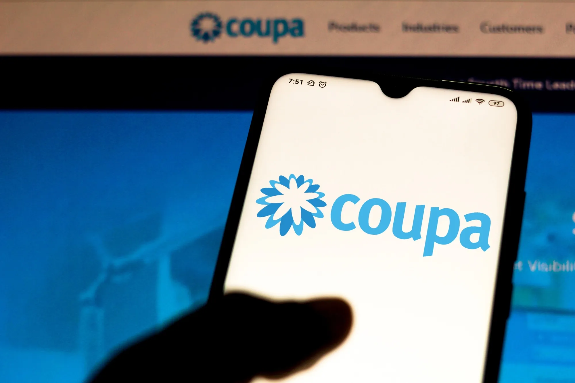 The Coupa Software logo is seen displayed on a smartphone.&nbsp;