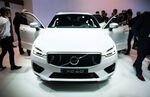 Attendees view the Volvo AG XC 60 vehicle on display during the 2017 New York International Auto Show (NYIAS) in New York, U.S., on Wednesday, April 12, 2017.
