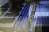 Covid-19 samples run through an assaying machine at a lab.