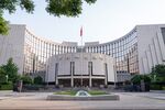 The People's Bank of China (PBOC) headquarters building in Beijing, China, on Wednesday, May 19, 2021. 