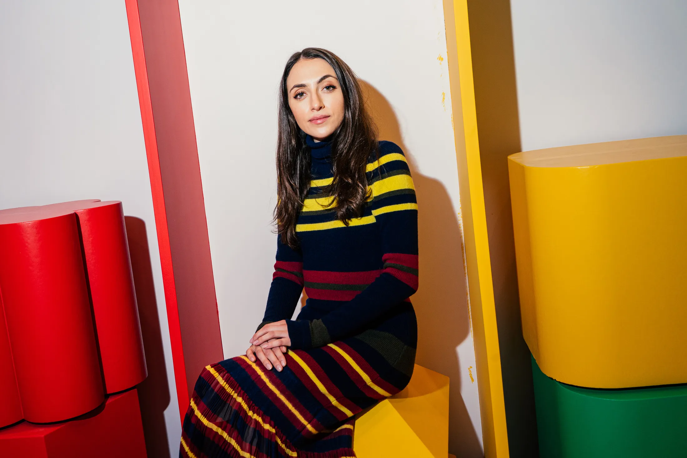 Cami Téllez, founder of Parade, sitting in the brand’s first store, which is set to open in New York next month.