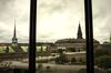 The old stock exchange building, left, also known as Borsbygningen, and Christiansborg Palace, right, sit on the city skyline seen from the headquarters of the Danish central bank in Copenhagen, Denmark.