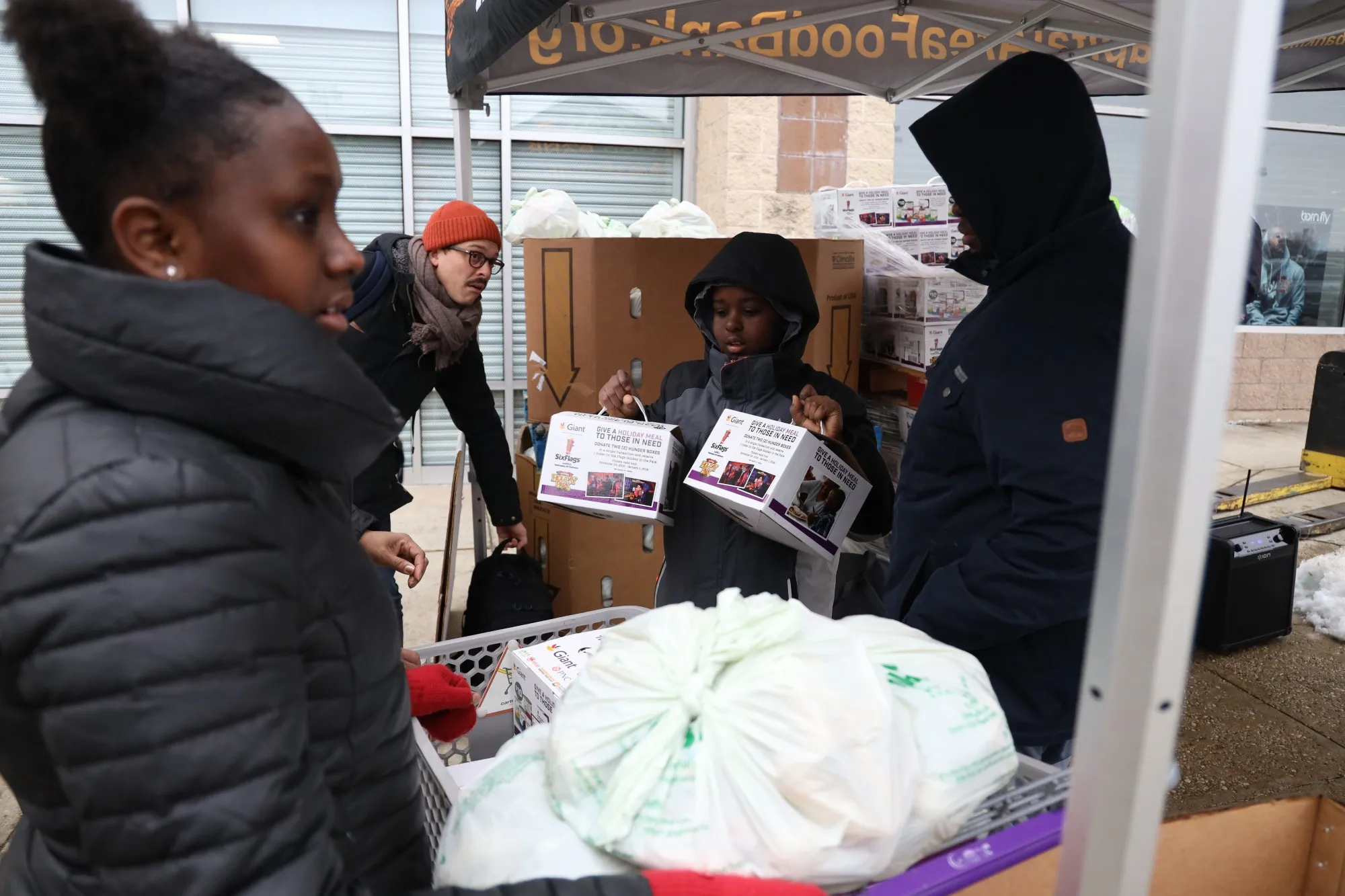 Volunteers prepare food boxes at a Capital Area Food Bank pop-stall for federal workers in Washington, D.C. on&nbsp;Jan. 19, 2018.&nbsp;