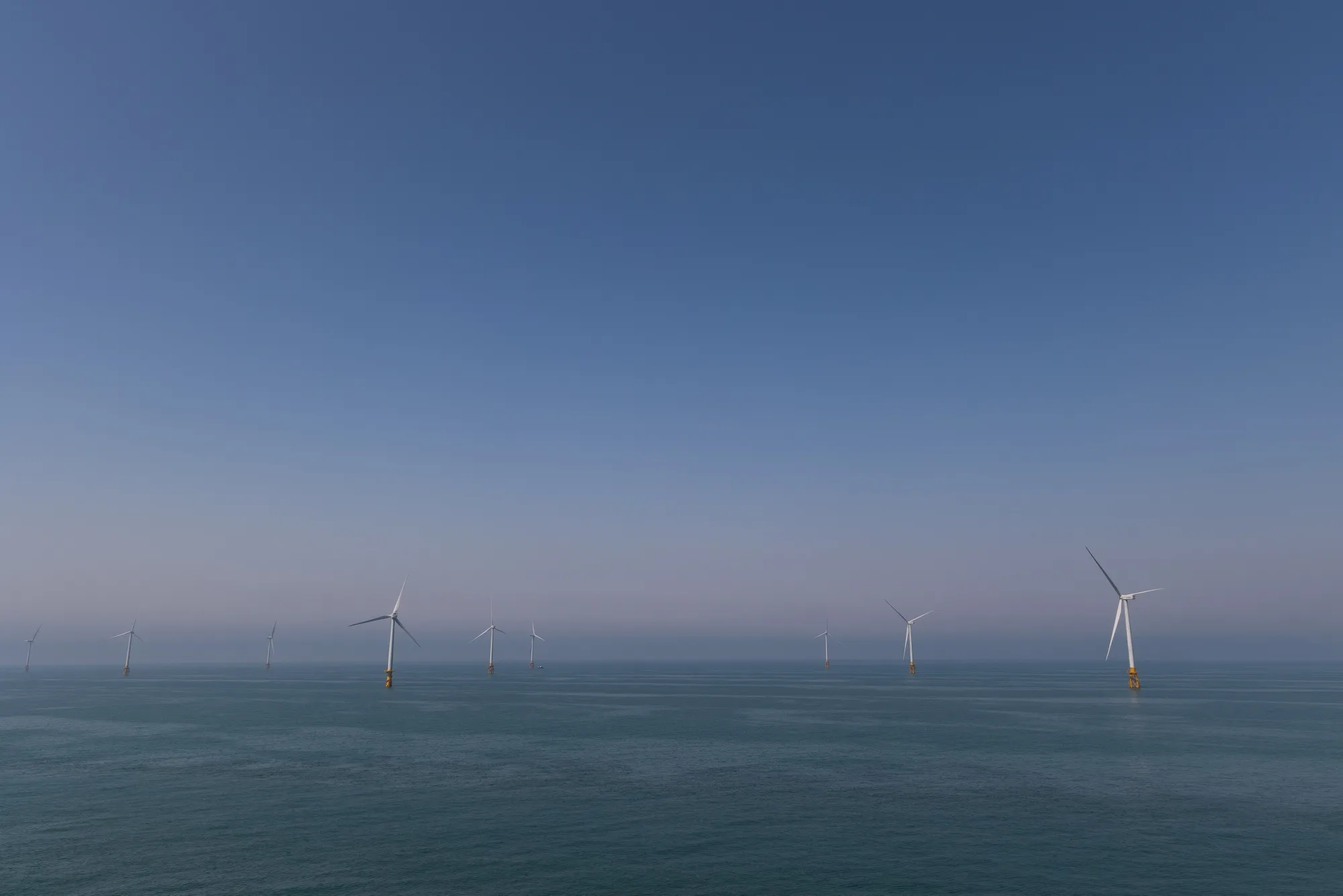 Wind turbines at an offshore wind farm.