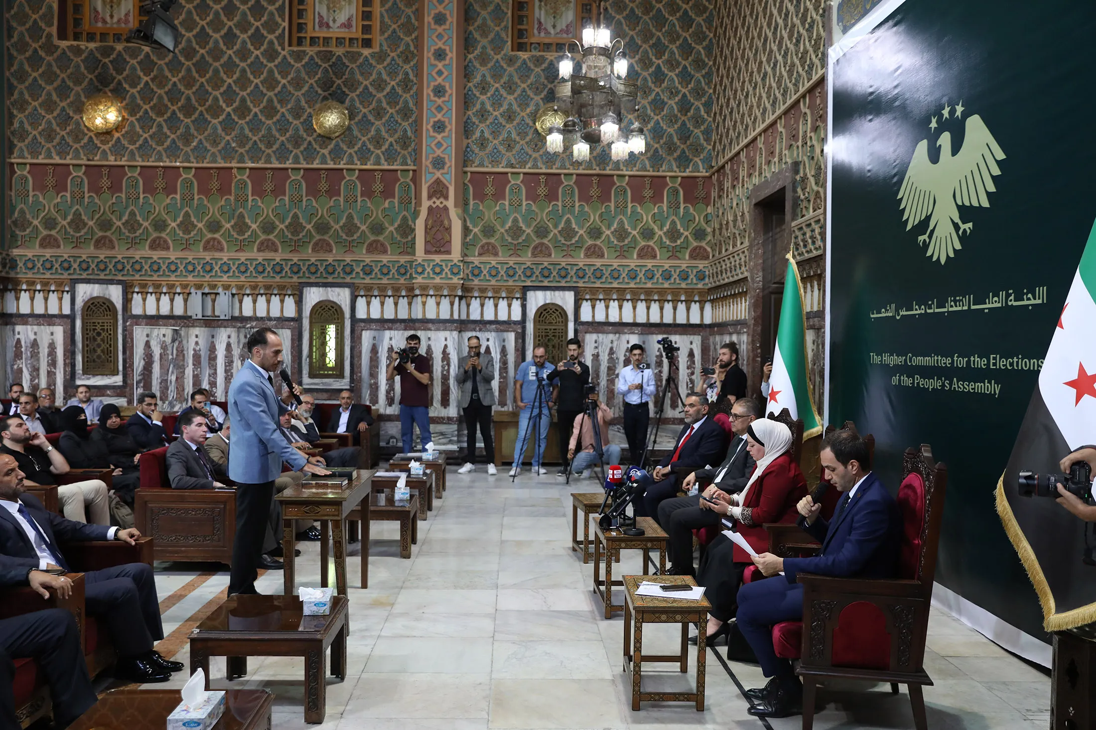 Members of the subcommittees affiliated with the High Electoral Commission, established for the People's Assembly elections,&nbsp;take an oath at a ceremony held in Damascus, Syria on Sept. 3.
