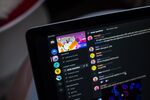 The Discord Inc. website on a laptop computer arranged in Hastings-on-Hudson, New York, on Tuesday, March 23, 2021. Microsoft Corp. is in talks to acquire Discord Inc., a video-game chat community, for more than $10 billion, according to people familiar with the matter.