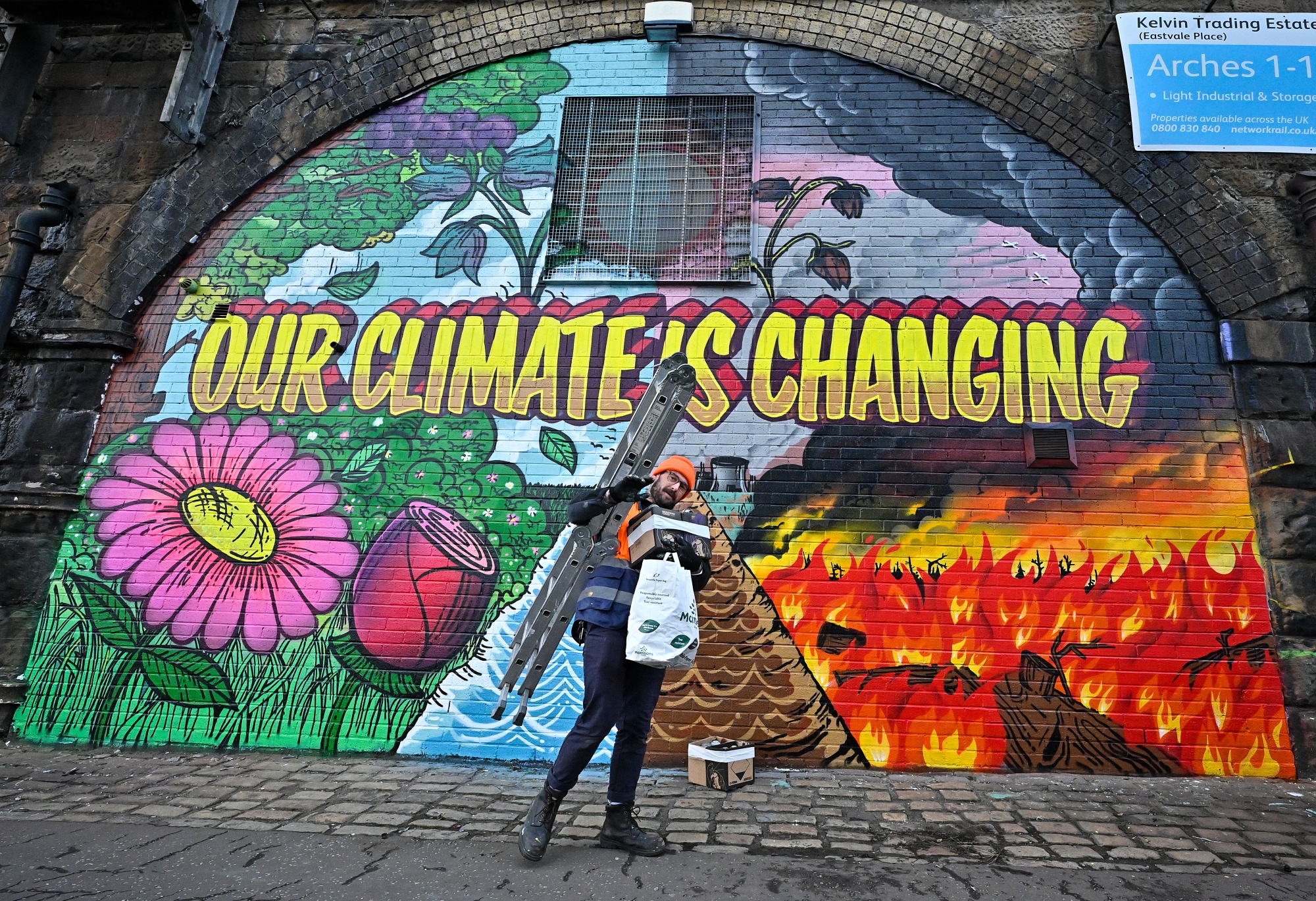 A mural near the Scottish Events Centre&nbsp;which will be hosting the COP26 summit.