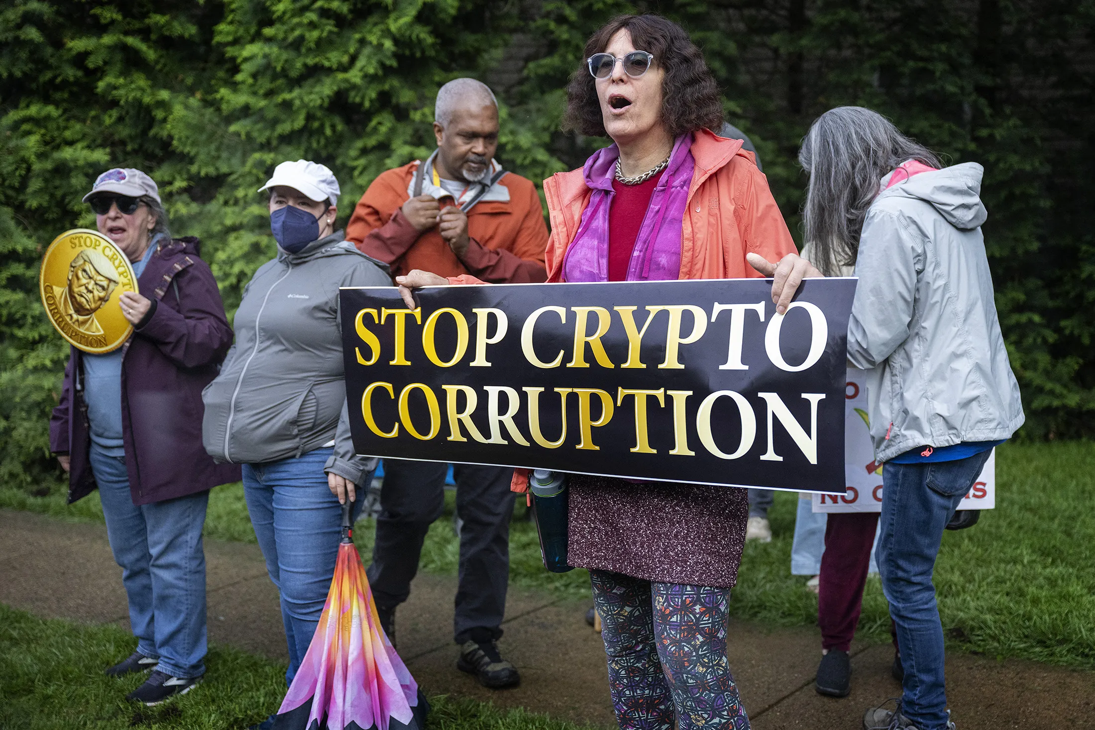 Demonstrators shout outside Trump National Golf Course in Sterling, Virginia, on May 22.