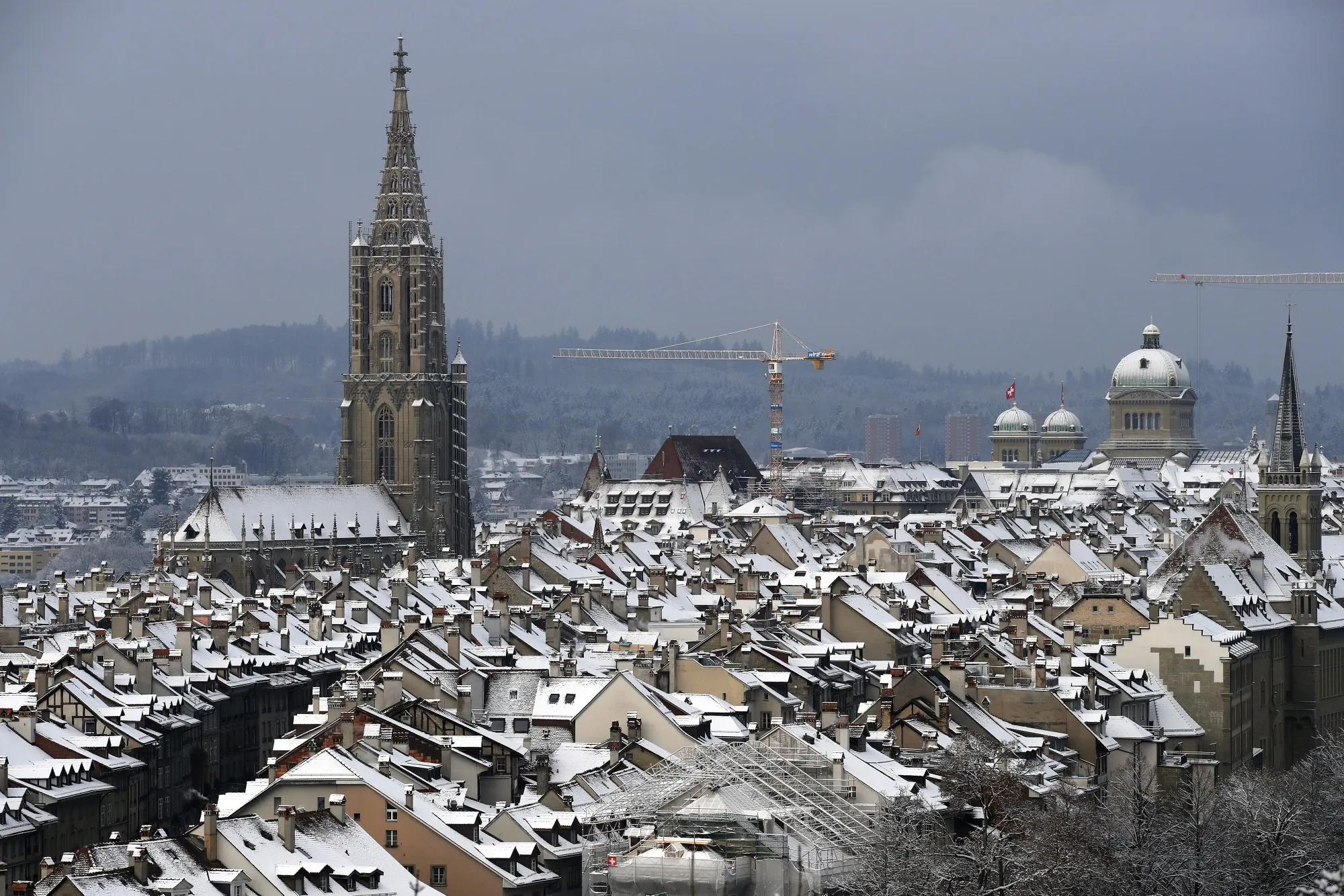 The Bern Minster cathedral and the Federal Palace in the old town of Bern, Switzerland.